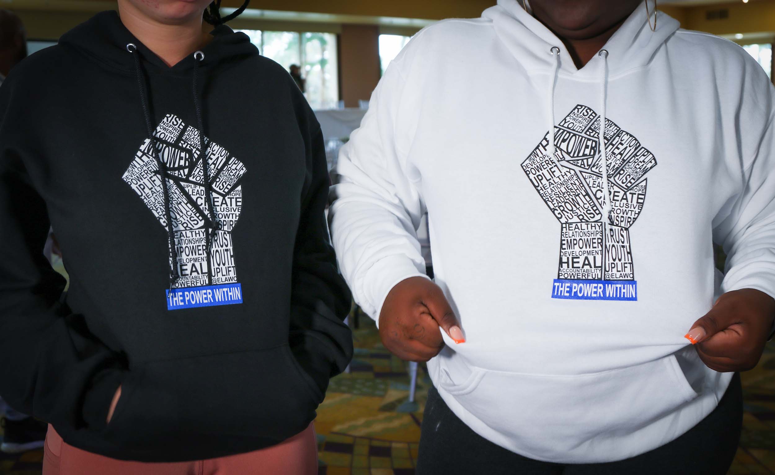 Empowered Youth in Saving Innocence Hoodies