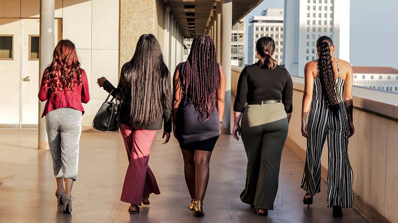 Group of young women walkng at sunset in Los Angeles